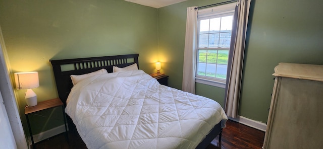 1972 N Colgate Ave, Springfield, MO 65802 - bedroom featuring wood finished floors and baseboards