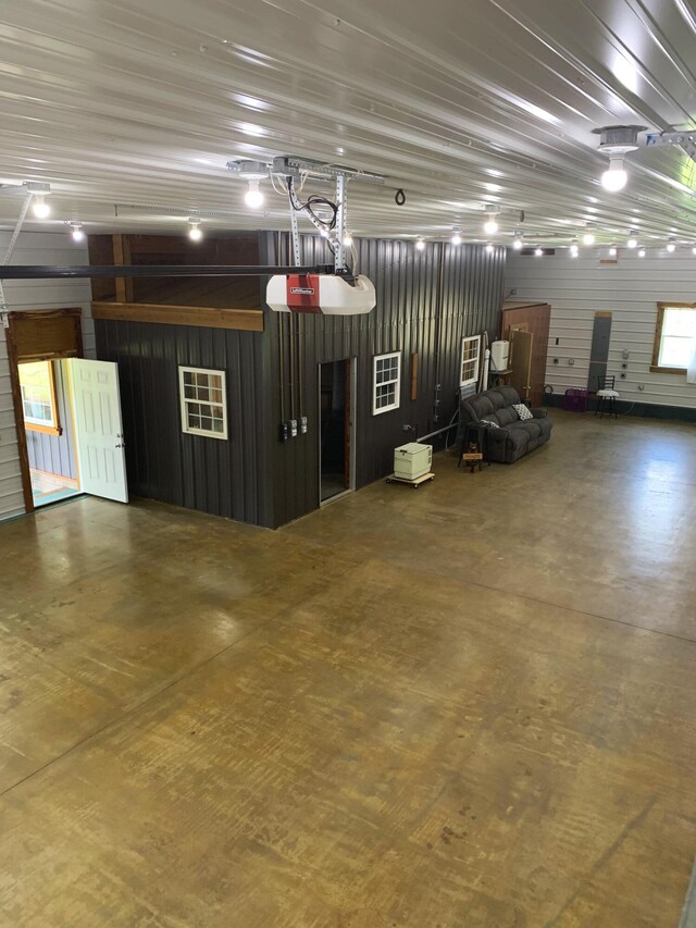 200 NE 90th Ln, Lamar, MO 64759 - garage featuring heating unit and a garage door opener