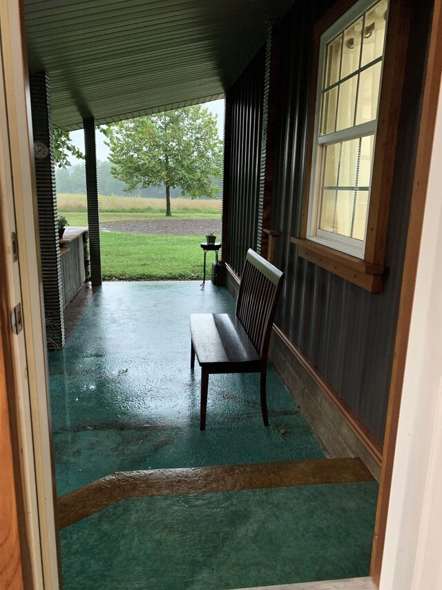 200 NE 90th Ln, Lamar, MO 64759 - covered porch with a yard