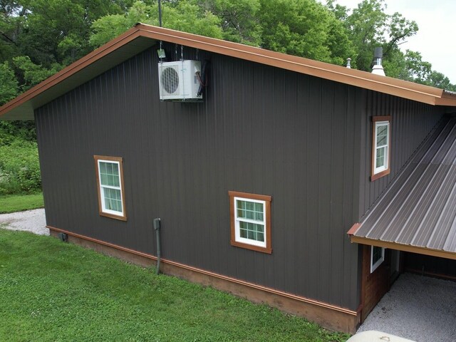 200 NE 90th Ln, Lamar, MO 64759 - view of property exterior featuring a cooling unit and a lawn