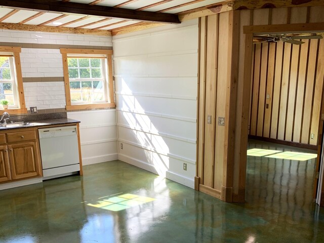 200 NE 90th Ln, Lamar, MO 64759 - kitchen featuring dishwasher, finished concrete floors, dark countertops, and brown cabinetry