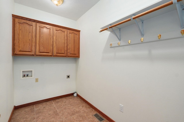 4520 English Ivy Ave, Springfield, MO 65804 - laundry area featuring hookup for a washing machine, cabinet space, and hookup for an electric dryer