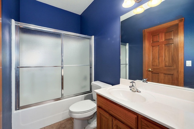 4520 English Ivy Ave, Springfield, MO 65804 - full bath with vanity, bath / shower combo with glass door, and tile patterned flooring