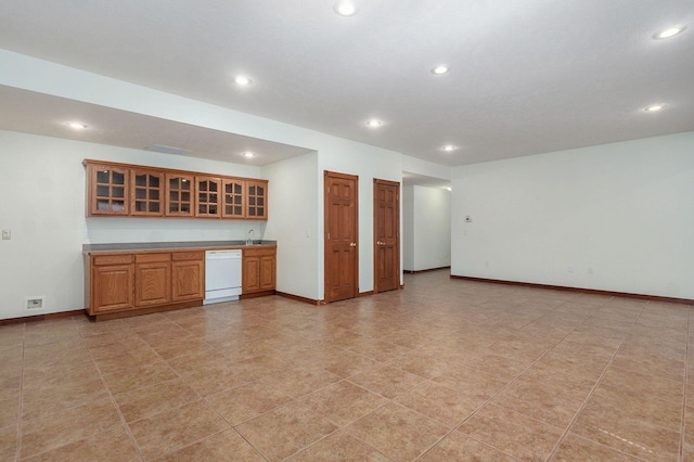 4520 English Ivy Ave, Springfield, MO 65804 - kitchen with white dishwasher, recessed lighting, glass insert cabinets, brown cabinets, and open floor plan