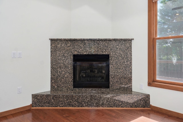 4520 English Ivy Ave, Springfield, MO 65804 - detailed view of wood finished floors and a fireplace