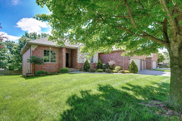 4520 English Ivy Ave, Springfield, MO 65804 - view of front of home featuring brick siding, driveway, an attached garage, and roof with shingles