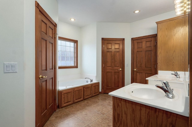 4520 English Ivy Ave, Springfield, MO 65804 - full bathroom with double vanity, a garden tub, tile patterned floors, and recessed lighting
