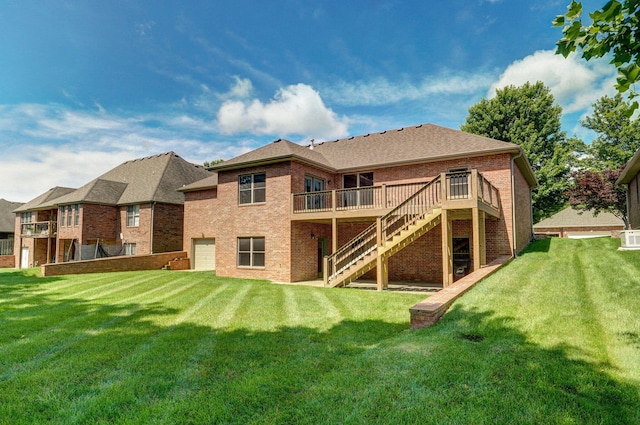 4520 English Ivy Ave, Springfield, MO 65804 - back of property with stairway, brick siding, a deck, and a yard