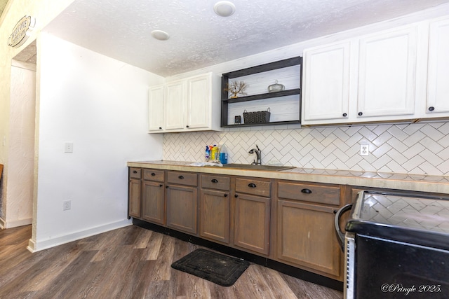 3331 US Highway 160, West Plains, MO 65775 - kitchen featuring electric stove, open shelves, light countertops, backsplash, and a textured ceiling