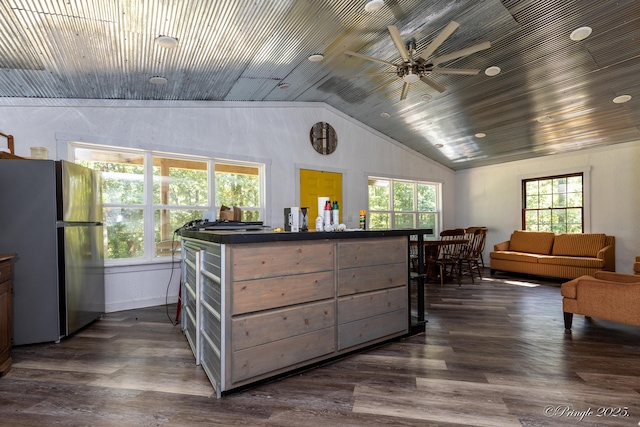 3331 US Highway 160, West Plains, MO 65775 - kitchen with freestanding refrigerator, lofted ceiling, dark wood-type flooring, dark countertops, and ceiling fan