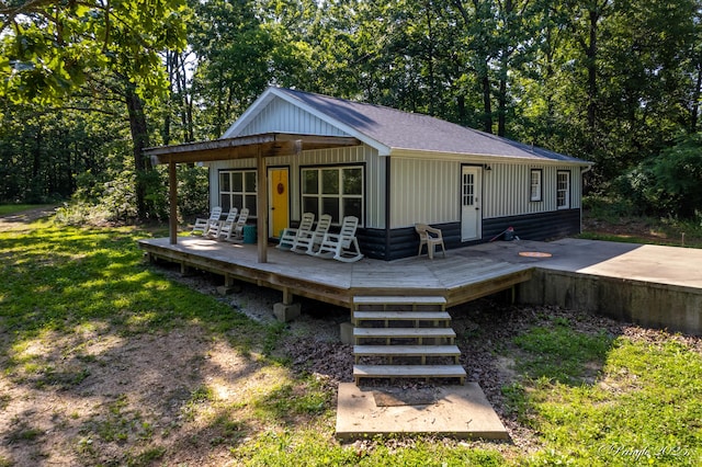 3331 US Highway 160, West Plains, MO 65775 - rear view of property featuring a deck and roof with shingles