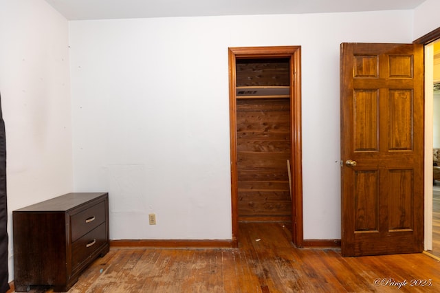 3331 US Highway 160, West Plains, MO 65775 - unfurnished bedroom featuring wood-type flooring and baseboards