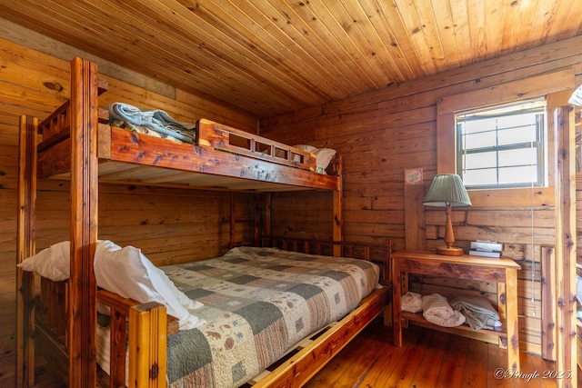 378 63rd Hwy S, Mammoth Spring, AR 72554 - bedroom featuring wood ceiling, wood walls, and hardwood / wood-style floors