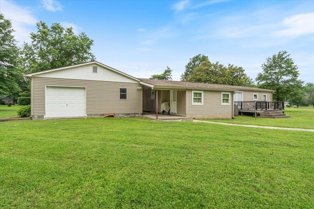 112 Riverview Dr, Anderson, MO 64831 - ranch-style home featuring an attached garage, a front lawn, and a deck