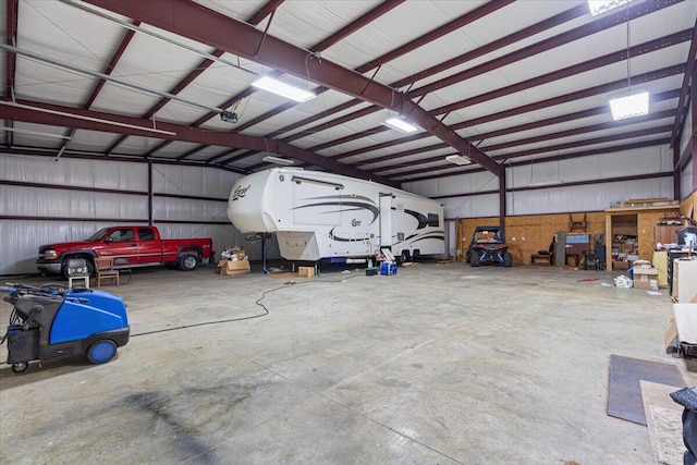 112 Riverview Dr, Anderson, MO 64831 - garage featuring metal wall