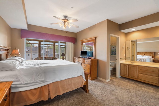 200 Glory Rd Unit 3, Branson, MO 65616 - bedroom featuring light carpet, ensuite bath, and a ceiling fan