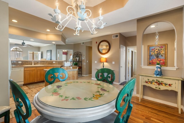 200 Glory Rd Unit 3, Branson, MO 65616 - dining space with ornamental molding, a ceiling fan, a chandelier, recessed lighting, and light wood finished floors