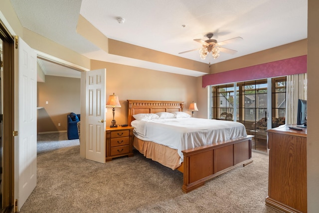 200 Glory Rd Unit 3, Branson, MO 65616 - carpeted bedroom featuring a ceiling fan