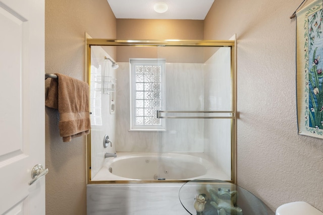 200 Glory Rd Unit 3, Branson, MO 65616 - full bathroom featuring a textured wall and a combined bath / shower with jetted tub