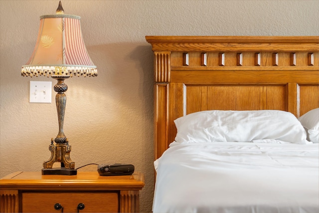 200 Glory Rd Unit 3, Branson, MO 65616 - bedroom featuring a textured wall