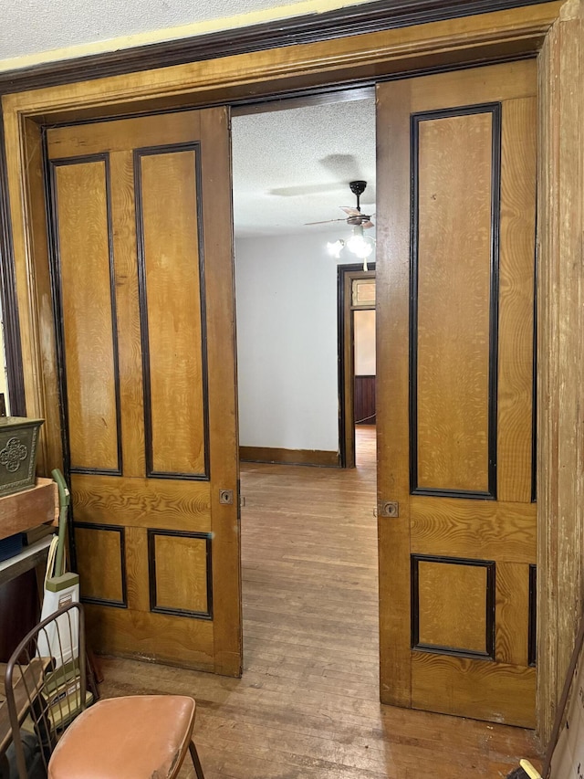 405 N Walnut St, Pierce City, MO 65723 - bathroom featuring wood finished floors and a ceiling fan