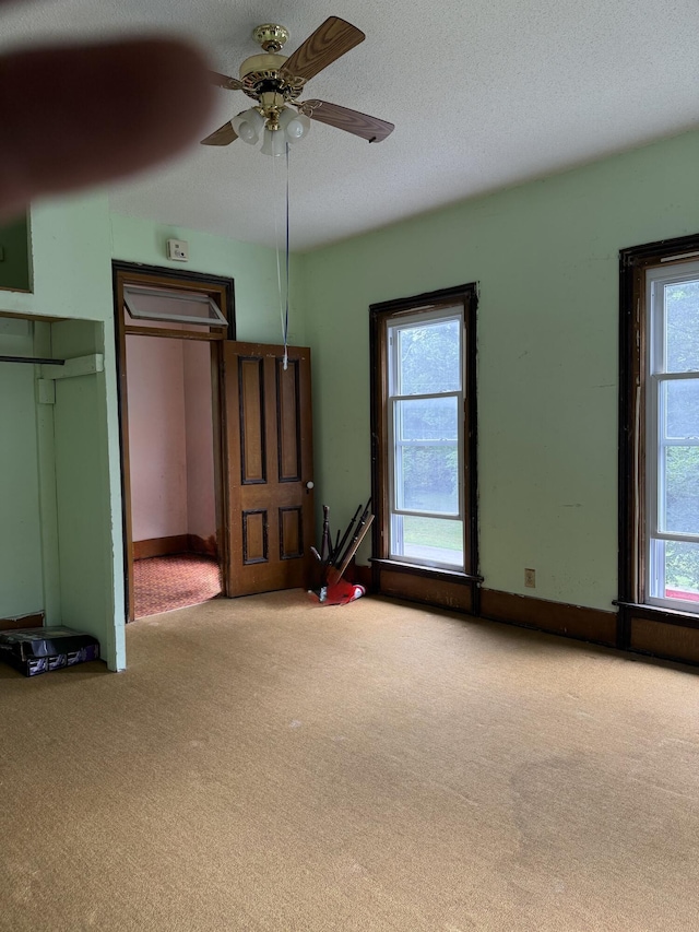 405 N Walnut St, Pierce City, MO 65723 - unfurnished bedroom with carpet flooring and ceiling fan