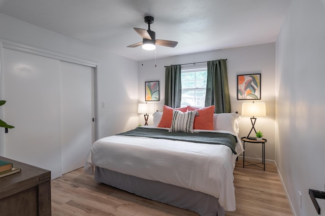 2443 S Kickapoo Ave, Springfield, MO 65804 - bedroom featuring light wood-style flooring, a closet, and a ceiling fan