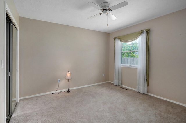 2133 E Cragmont St, Springfield, MO 65804 - carpeted spare room featuring a ceiling fan and baseboards