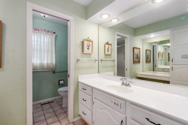 2133 E Cragmont St, Springfield, MO 65804 - full bath with vanity, tile patterned flooring, and recessed lighting