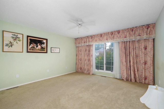 2133 E Cragmont St, Springfield, MO 65804 - empty room with carpet and ceiling fan