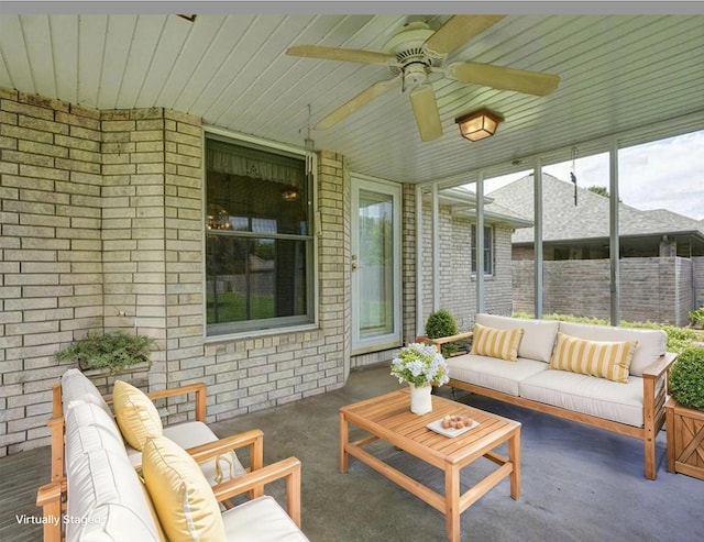 2133 E Cragmont St, Springfield, MO 65804 - sunroom / solarium featuring an outdoor living space and ceiling fan