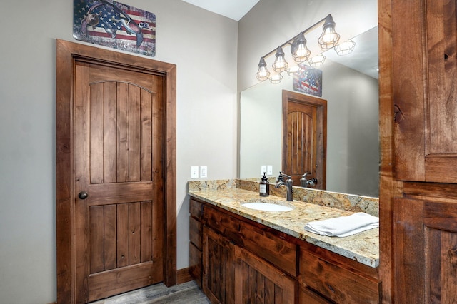 1721 Jackson Spring Rd, Ozark, MO 65721 - bathroom with vanity and wood finished floors