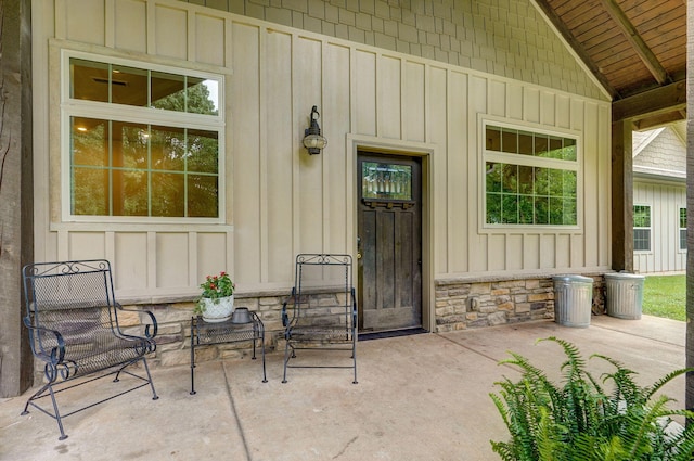 1721 Jackson Spring Rd, Ozark, MO 65721 - view of exterior entry featuring board and batten siding and stone siding