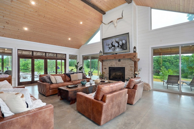 1721 Jackson Spring Rd, Ozark, MO 65721 - living area with high vaulted ceiling, wood ceiling, a stone fireplace, finished concrete flooring, and recessed lighting