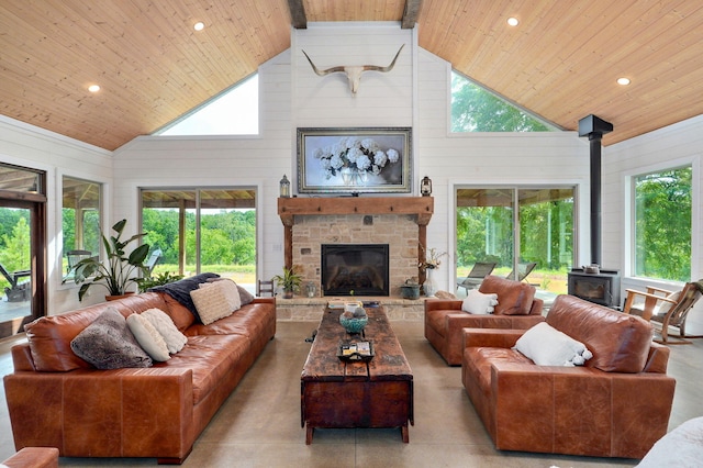 1721 Jackson Spring Rd, Ozark, MO 65721 - living area with a wood stove, wood ceiling, high vaulted ceiling, a fireplace, and recessed lighting