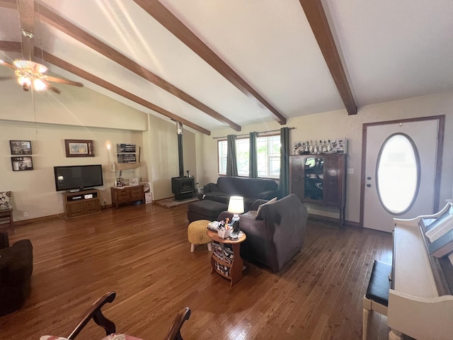 1014 Sassafras St, Willow Springs, MO 65793 - living area featuring a wood stove, ceiling fan, and wood finished floors