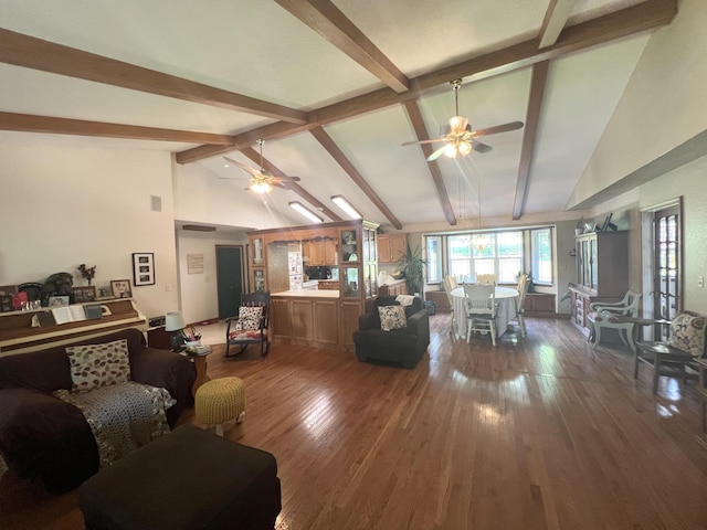 1014 Sassafras St, Willow Springs, MO 65793 - living room featuring ceiling fan, wood finished floors, beamed ceiling, and high vaulted ceiling