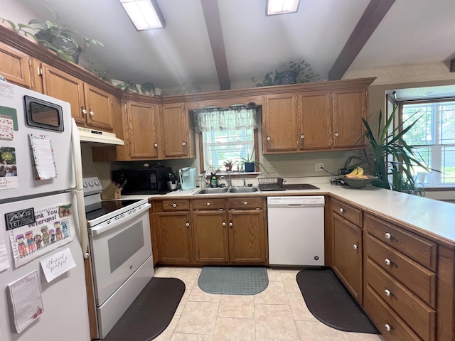 1014 Sassafras St, Willow Springs, MO 65793 - kitchen with white appliances, brown cabinets, under cabinet range hood, beamed ceiling, and light countertops