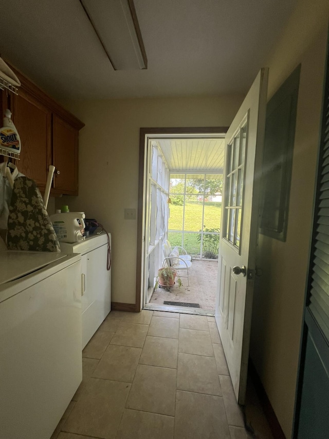 1014 Sassafras St, Willow Springs, MO 65793 - laundry room featuring independent washer and dryer, cabinet space, and light tile patterned floors
