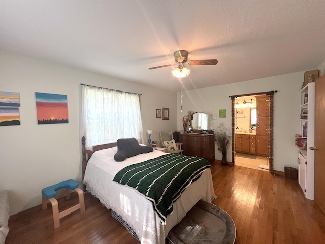 1014 Sassafras St, Willow Springs, MO 65793 - bedroom with light wood-type flooring, a ceiling fan, and ensuite bath