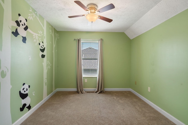3115 E Lark St, Springfield, MO 65804 - empty room featuring a textured ceiling, carpet, a ceiling fan, and lofted ceiling