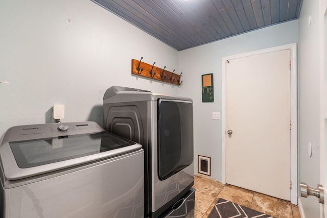 3115 E Lark St, Springfield, MO 65804 - laundry area featuring separate washer and dryer and light stone finish floors