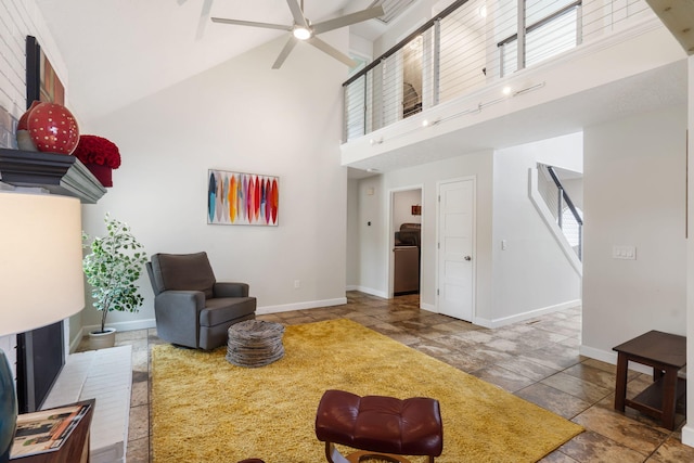 3115 E Lark St, Springfield, MO 65804 - living room featuring high vaulted ceiling, a ceiling fan, and stone tile floors
