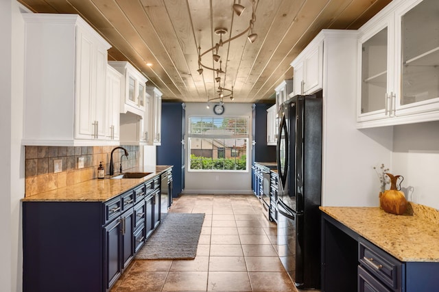 3115 E Lark St, Springfield, MO 65804 - kitchen with blue cabinetry, freestanding refrigerator, white cabinets, wood ceiling, and track lighting