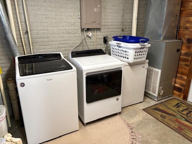 21572 Lawrence Unit 1240, Aurora, MO 65605 - laundry room with washing machine and dryer and electric panel
