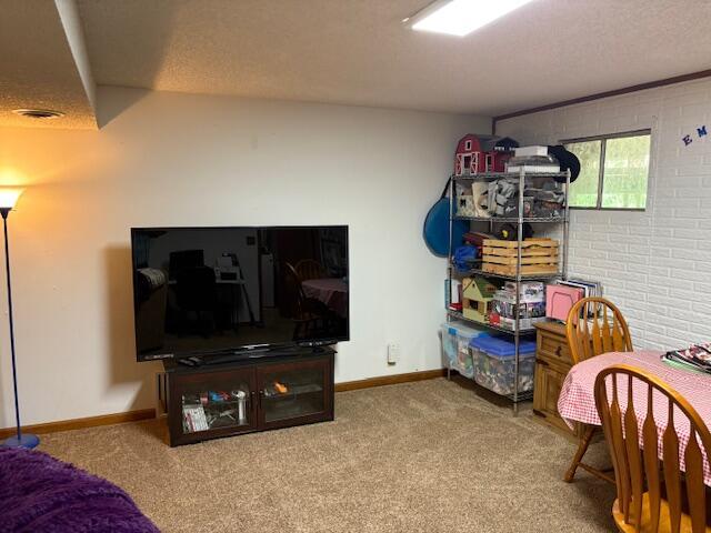 21572 Lawrence Unit 1240, Aurora, MO 65605 - carpeted bedroom with a textured ceiling
