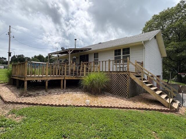 21572 Lawrence Unit 1240, Aurora, MO 65605 - back of house with a deck and a yard