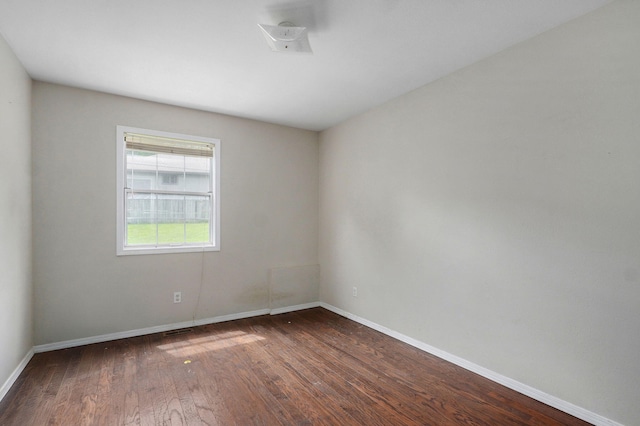 5911 S Farm Rd Unit 157, Springfield, MO 65810 - empty room with wood finished floors and baseboards