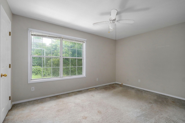 5911 S Farm Rd Unit 157, Springfield, MO 65810 - carpeted spare room with baseboards and a ceiling fan