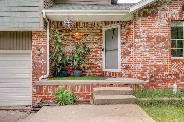 5911 S Farm Rd Unit 157, Springfield, MO 65810 - entrance to property featuring a garage and brick siding